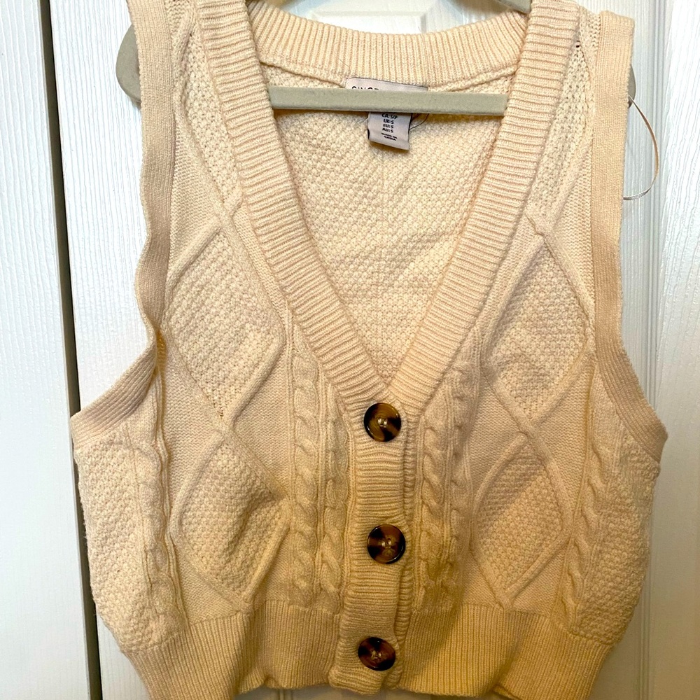 Cream color sweater vest